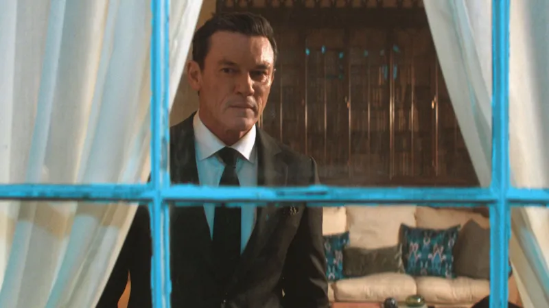 Actor Luke Evans said he has survived Hollywood by "watching and listening" to actors he admired. Pontypool-born Evans made the observation while discussing his similarities and "emotional connection" to his character in a new ITV drama, The Party. It will see Evans star as Martin Gilmour, a journalist shaped by his lifelong friendship with a wealthy and charismatic politician played by Aberystwyth-born Tom Cullen. The stars have been seen filming at multiple locations, including a park and bars in Cardiff and Rhondda Cynon Taf, since October. The thriller moves between the birthday party of Cullen's character, Ben Fitzmaurice, and a police investigation that follows. Evans, who is also an executive producer of the five-part series, said he drew on his own experiences to play the character. "I think that's probably why I resonated with the story when I read the book," Evans said of the novel the series, which is based the book written by Elizabeth Day. "Watching and listening is how I've managed to survive this industry. "If I'm on a film set, I'm always watching other actors or older actors that I've been admiring for years," he added. Evans said this trait of watching others was something he shared with Gilmour, who he said he connected with on a "very deep level". "It's not always possible when you play a role that you can pull on your own personal life or experiences. "In this role I definitely could, even when Martin chooses completely different life choices to ones I would make in his position," he said. WORLDPRODUCTIONS/PA Tom wears a black suit with a white shirt and red tie, He has a grey pocket square. He holds a glass tumblerWORLDPRODUCTIONS/PA Aberystwyth-born Tom Cullen will star as politician Ben Fitzmaurice in The Party Evans described the programme as a "gripping exploration of loyalty, class and the truths we hide", describing Gilmour as a "very complex, deep, fascinating and tragic character". Luke Evans reveals his secret to surviving Hollywood